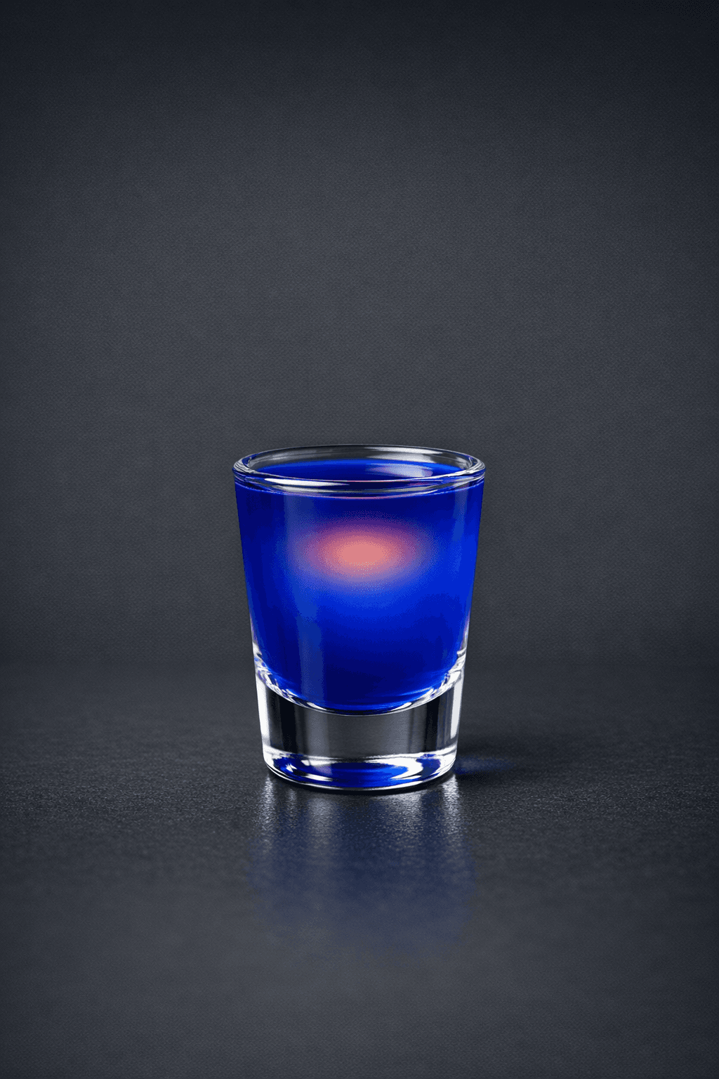 Layer by Layer served in a shot glass